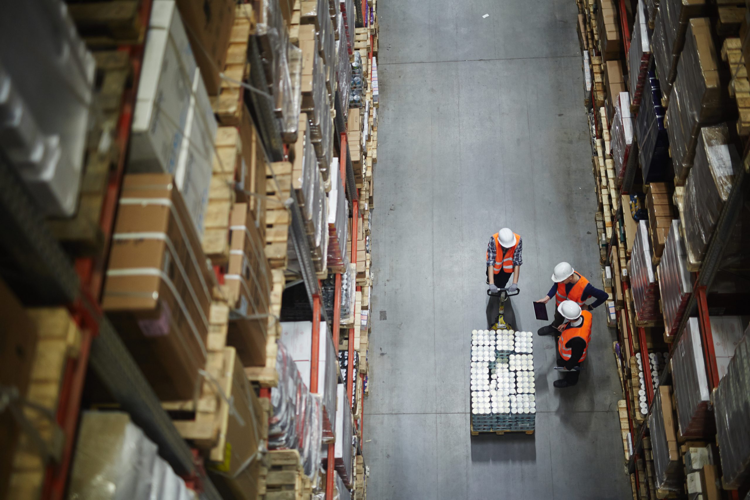 Loaders at work in warehouse